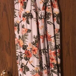 Colorful pant romper with lacy back.